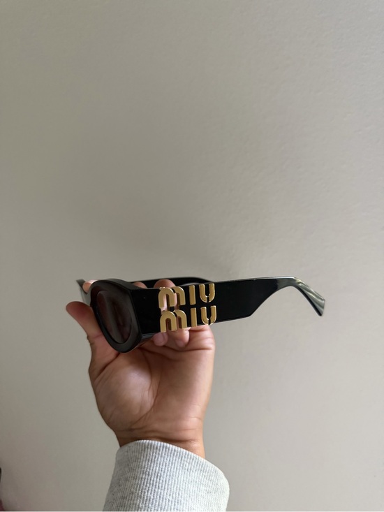 Miu Miu Accessories - Miu Miu Black Sunglasses with Gold Logo Accent